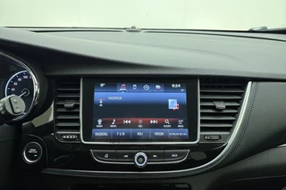 Opel Mokka X 1.4 Turbo 140pk Innovation | Navigatie | Achteruitrijcamera | Parkeersensoren | Keyless | Climate control | Cruise control | Extra getint glas | Lichtmetalen velgen / 21