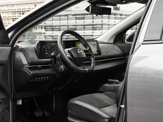 Nissan Ariya Evolve 91 kWh | SOH 99% | Panoramadak | Trekhaak | ACC | HUD | Voorstoelen verwarmd en geventileerd | Warmtepomp | 360 Camera | 19" / 12