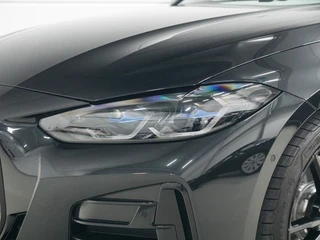 BMW 4 Serie Coupé M440i Schuifdak | Harman Kardon | M Stoelen / 36