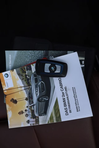 BMW 2 Serie Cabrio M235i xDrive Centennial High Executive Cruise Control, Airco, Apple Carplay, Camera, Navigatie, Prijs Is Rijklaar Inclusief 6 Maanden Garantie / 18