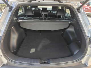 Toyota Corolla Cross 2.0 High Power Hybrid First Edition BLIND-SPOT EL-ACHTERKLEP LM-VELGEN KEYLESS PARK-SENSOREN STOELVERW DRAADLOOS-LADEN AD-CRUISE BLUETOOTH / 12
