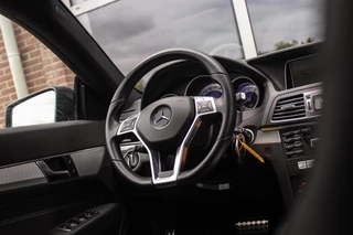 Mercedes E-klasse Coupé 200 Prestige Sport AMG pakket | Automaat | NL auto | 184 pk | 20 inch | Camera | Xenon | PDC | Sportstuur | Cruise-control | Climate-control | Leer / 21