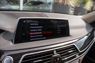 BMW 7-serie 740i High Executive | 2e eigenaar | Driving Assistant Plus | Innovation pakket | Massage | Dodehoekdetectie | Adaptieve cruise | 360 camera | Stoelventilatie | Gesture control / 32