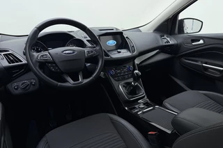 Ford Kuga 1.5 EcoBoost Titanium | Trekhaak | Achteruitrijcamera | Airco | Navigatie | Elektrische achterklep | Cruise control | Start/Stop bediening | Climate control | Parkeersensoren | Lederen/stof interieur | Stuurbediening / 17