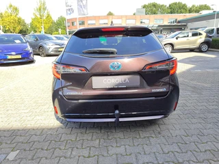 Toyota Corolla Touring Sports 1.8 Hybrid Style TREKHAAK BLIND SPOT STOEL/STUURVERW PARK-SENSOREN HEAD-UP EL-ACHTERKLEP APPLE/ANDROID 16'' LM-VELGEN AD-CRUISE CLIMA / 42