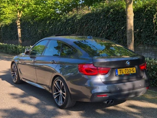 BMW 3-serie Gran Turismo GT M Sport OPTIES Panorama CarPlay Adaptieve Cruise Elek. Trekhaak Camera 2e Eigenaar 320i High Executive / 5