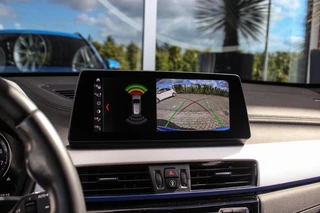BMW X1 xDrive25e High Executive M sport | 1e eigenaar | Dealer onderhouden | Panoramadak | Apple Carplay | Camera | LED adaptief | Head-up | Stoelverwarming | Cruise control / 27