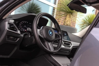 BMW 3-serie Touring 330e High Executive | 1e eigenaar | BTW auto | M-sport stuur | HiFi audio | Sportstoelen | Cruise control adaptief | Grootlichtassistent | Active Guard Plus / 37