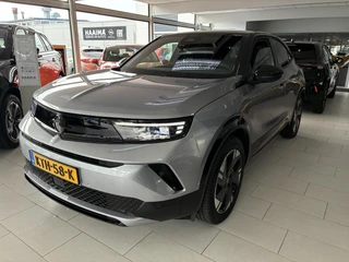 Opel Mokka Electric GS 54 kWh | Climate control | Navigatie | Verwarmbaar stuur | Elektrisch Pakket | Camera | Parkpilot | 18" LM-Velgen | Parkpilot / 48