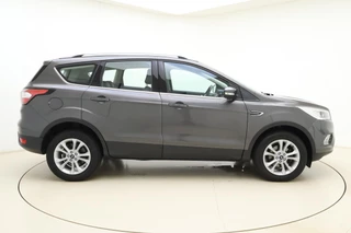 Ford Kuga 1.5 EcoBoost Titanium | Trekhaak | Achteruitrijcamera | Airco | Navigatie | Elektrische achterklep | Cruise control | Start/Stop bediening | Climate control | Parkeersensoren | Lederen/stof interieur | Stuurbediening / 10