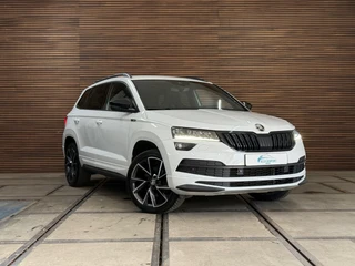 Skoda Karoq 1.5 TSI DSG 4x4 Sportline Business | 1800KG Trekgewicht | Carplay | Sportstoelen | Camera / 11