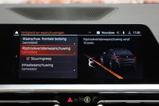 BMW 3 Serie Sedan 330i High Executive M Sport Pakket Automaat  / Live Cockpit Professional / Head-Up Display / Leder / Harman Kardon / LED / Stoelverwarming / Driving Assistant / Achteruitrijcamera / M Sportremsysteem / DAB / Ambiance Verlichting / 32