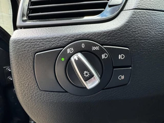 BMW X1 DRIVE20i CHROME LINE | AIRCO | NAVIGATIE | CRUISE | PDC | VELGEN | TREKHAAK | NAP / 19