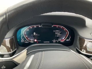 BMW 7 Serie 730d xDrive ACC Pano Softclose 4wielsturing High Executive HUD / 21