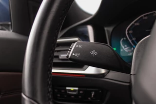 BMW 3-serie Touring 320e High Executive Sport Line | 1e eigenaar | NL auto | Driving Assistant | HiFi audio | LED | 18 inch | Stoelverwarming | DAB | Carplay | Navigatie | PDC / 23