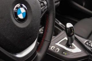 BMW 1-serie 125i Business+ | Sport Line | NL auto | Schuif-/kanteldak | Keyless entry | HiFi audio | Stoelverwarming | Xenon | Sportstuur | Navigatie Professional | Bluetooth | PDC / 36
