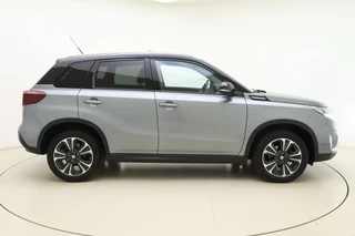 Suzuki Vitara 1.4 Boosterjet Style Smart Hybrid 129pk | Panoramadak | Trekhaak | Climate Control | Cruise Control Adaptief | Camera | Stoelverwarming | Navigatie | Parkeersensoren / 10