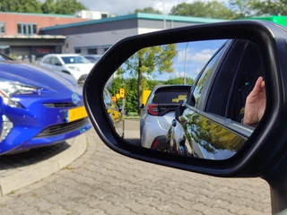 Toyota Corolla Touring Sports 1.8 Hybrid Style TREKHAAK BLIND SPOT STOEL/STUURVERW PARK-SENSOREN HEAD-UP EL-ACHTERKLEP APPLE/ANDROID 16'' LM-VELGEN AD-CRUISE CLIMA / 36