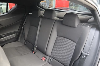 Toyota C-HR 1.8 HYBRID STYLE APPLE/ANDROID STOELVERW. BLIND-SPOT NAVI AD-CRUISE HALF-LEDER 18"LM-VELGEN / 18