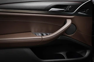 BMW X4 xDrive20i Business Edition Plus | PANORAMADAK | HEAD UP | HOUTAFWERKING | STUURVERWARMING | 19" / 29