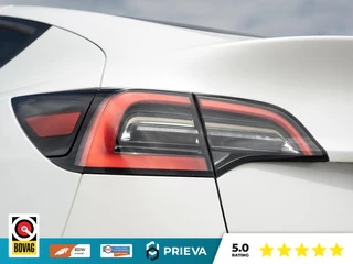 Tesla Model Y Long Range AWD SoH 91,1%| 513 pk | 2023 | Trekhaak | Panorama | Dealer onderhouden / 10