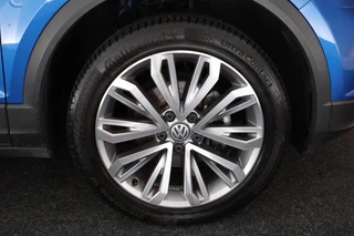 Volkswagen T-Roc 1.5 TSI 150pk DSG Sport Trekhaak Stoelverwarming Camera Keyless Navigatie / 39