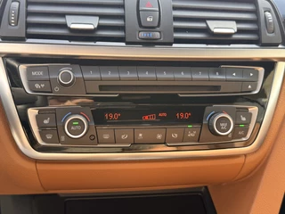 BMW 4 Serie Cabrio 428i High Executive  | Bi-Xenon | Navi | Sportstoelen | Nek- en Stoelverwarming | PDC | Bluetooth / 34