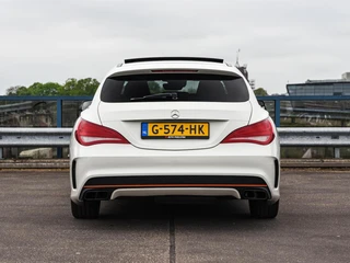 Mercedes-Benz CLA-klasse Shooting Brake 200 OrangeArt AMG Night Edition 156 PK | Panoramadak | Bi-xenon | Camera | Stoelverwarming | Navigatie | 18" / 6