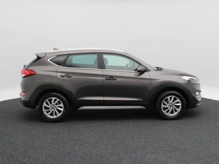 Hyundai Tucson 1.6 GDi 132Pk Comfort | Stoelverwarming | Trekhaak | Camera | Cruise Control | CarPlay | Climatronic | 17 Inch / 9