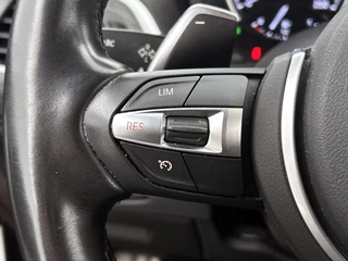 BMW 1-serie M140i xDrive | Stoelverwarming | Cruise Control | Navigatie / 16