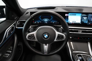 BMW 4 Serie Gran Coupé M440i xDrive High Executive  ACC Opendak Wide Screen Head-up H&K Trekhaak Carbon Laser Light Portimao Blue! / 7