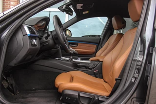 BMW 3-serie Touring 318i Centennial Executive M-sport | 2e eigenaar | HiFi audio | Navigatie | Bluetooth | Climate control | M-sportstuur | Cruise control | PDC | 18 inch | Trekhaak / 14