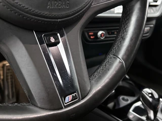 BMW 1-serie M135i xDrive | Camera | Stoelverwarming |Harman/Kardon | HeadUp Display | Cruise Control / 24