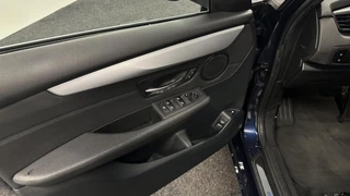 BMW 2-serie Active Tourer 225xe Centennial High Executive PANO LEER HEAD UP. / 23