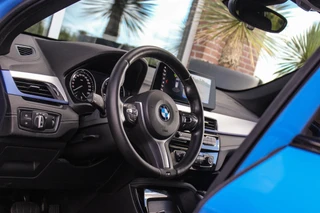 BMW X1 xDrive25e High Executive M sport | 1e eigenaar | Dealer onderhouden | Panoramadak | Apple Carplay | Camera | LED adaptief | Head-up | Stoelverwarming | Cruise control / 38