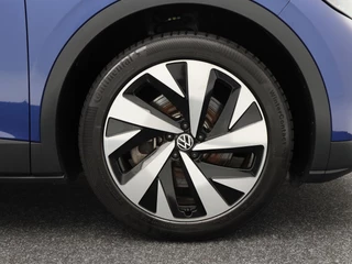 Volkswagen ID.4 First 77 kWh 204 Pk | Stoel/Stuurverwarming | Camera | Half Leer | CarPlay | Adaptive cruise | 20 Inch | 97.053 Km !! / 9