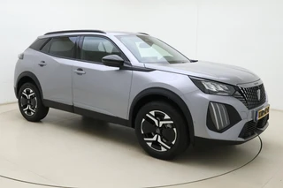 Peugeot 2008 1.2 Hybrid 145 Allure Navigation Pack l Vision Pack l DAB l LED l Bluetooth l Wireless Apple Carplay & Android Auto l 360 Camera l Adaptive Cruise Control l Climate Control l Lichtmetalen Velgen / 9