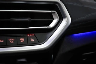 BMW X4 xDrive20i Business Edition Plus | PANORAMADAK | HEAD UP | HOUTAFWERKING | STUURVERWARMING | 19" / 9