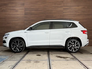 Skoda Karoq 1.5 TSI DSG 4x4 Sportline Business | 1800KG Trekgewicht | Carplay | Sportstoelen | Camera / 37