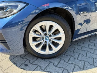 BMW 3-serie Touring 320e High Executive *Laser Koplampen* / 38