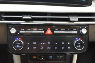 Hyundai Tucson 1.6 T-GDi HEV Aut. Premium Sky |Schuifdak |Beige Leder . / 32