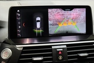 BMW X3 xDrive30i High Executive xLine Automaat  / Panoramadak / Trekhaak / Sportstoelen / Leder / 19 Inch / Driving Assistant Plus / Hifi / LED / Head-Up Display / Achteruitrijcamera / Stoelverwarming / Adaptief Onderstel / Multifunctioneel Instrumentenpaneel / 32