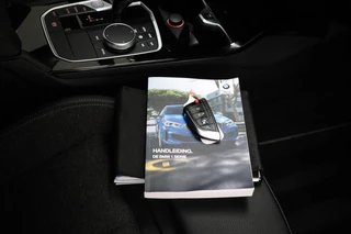 BMW 1-serie 118i Executive Edition | HALF LEDER | DAB | APPLE | DRAADLOZE LADER | CAMERA | 17" / 51