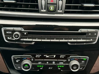 BMW X1 SDrive18i Centennial High Executive | Trekhaak | Leder | Navigatie | Stoelverwarming | Cruise/Control | Climate Control | / 36