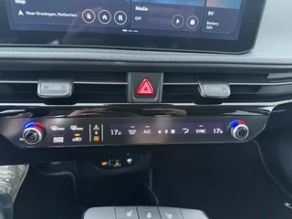 Kia EV6 Air 84 kWh  - SOH 99,1% - Stoel-/stuurverwarming - Cruise Control Adaptief - Climate Control - CarPlay - Fabrieksgarantie tot 08-2033 / 32