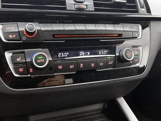 BMW 1-serie M140i xDrive | Stoelverwarming | Cruise Control | Navigatie / 23