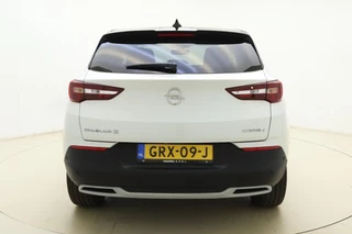 Opel Grandland X 1.6 Turbo 300pk Hybrid4 Elegance | Navigatie | Keyless | Camera | Parelmoer kleur | Electrische achterklep | Lichtmetalen velgen | AGR Comfortstoelen | Voorruitverwarming | Zwart dak / 12