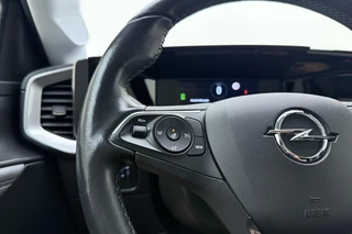 Opel Mokka 1.2 100pk Business Elegance | Navigatie | Achteruitrijcamera | Climate control | Cruise control | Stoel- en stuurverwarming | Lichtmetalen velgen / 18