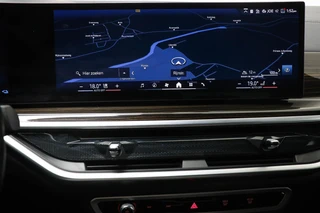 BMW X5 xDrive50e M-Sport | PANORAMADAK | HEAD UP | HOUTAFWERKING | ACHTERBANKVERWARMING | TREKHAAK | 360 CAMERA | 21" / 51