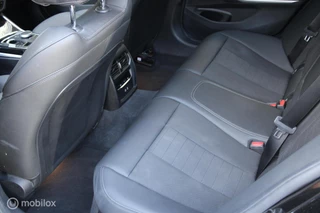 BMW 3-serie Touring 320e xDrive/Led/Trekhaak/Navi/Tel/All seas/ / 22